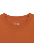 ニューエラ S/S OVERSIZED COTTON TEE 24 TYPOGRAPHY ラストオレンジ