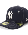 ニューエラ PRE-CURVED 59FIFTY MLB FLOWER EMBROIDERY NYネイビー